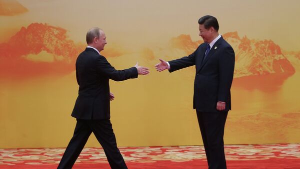 Vladimir Putin i Si Điping na samitu Azijsko-pacifičke ekonomske saradnje - Sputnik Srbija