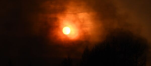 Дим од пожара заклања сунце у Забајкалском крају Дим од пожара заклања сунце у Забајкалском крају - Sputnik Србија