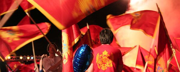 Zastave Crne gore po proglašenju izborne pobede stranke Mila Đukanovića u Podgorici Zastave Crne gore po proglašenju izborne pobede stranke Mila Đukanovića u Podgorici - Sputnik Srbija