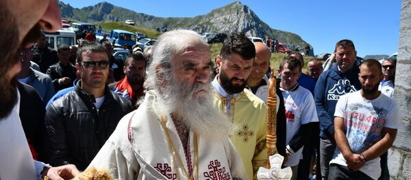 Митрополит Амфилохије после литургије на светог Илију на Кучком Кому Митрополит Амфилохије после литургије на светог Илију на Кучком Кому - Sputnik Србија