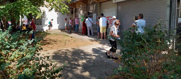 Велики ред за гласање у месној заједници 19. децембар у Подгорици. Велики ред за гласање у месној заједници 19. децембар у Подгорици. - Sputnik Србија