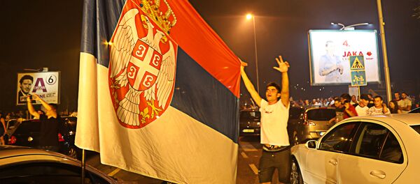 Славље присталица опозиције у Подгорици после избора у Црној Гори Славље присталица опозиције у Подгорици после избора у Црној Гори - Sputnik Србија