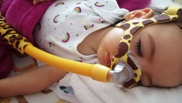 Jedanaestomesečna beba Minja Matić, obolela od spinalne atrofije mišića. - Sputnik Srbija