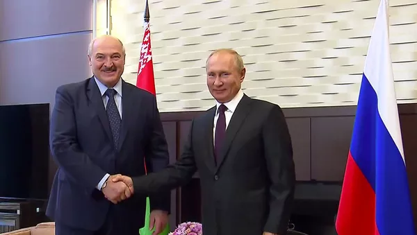 Председници Белорусије и Русије, Александар Лукашенко и Владимир Путин, на састанку у Сочију - Sputnik Србија