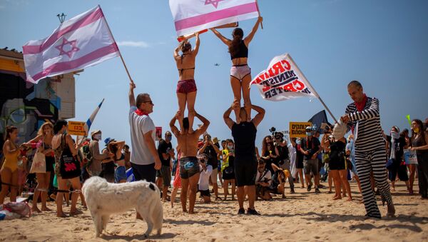 Протест на плажи у Тел Авиву - Sputnik Србија