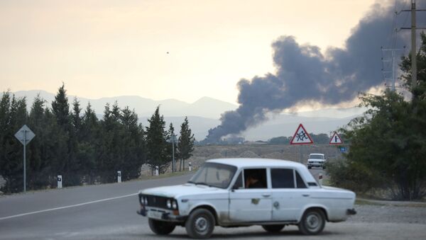 Дим након гранатирања града Тертер током сукоба у Нагорно-Карабаху - Sputnik Србија