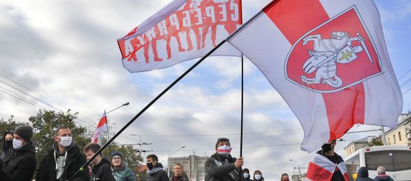 Присталице белоруске опозиције на протесту у Минску Присталице белоруске опозиције на протесту у Минску - Sputnik Србија