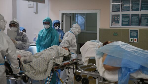 Zdravstveni radnici i pacijenti u bolnici za pacijente sa kovidom 19 u Moskvi - Sputnik Srbija
