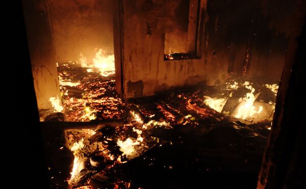 Zapaljena kuća u gradu Karvačar - Sputnik Srbija
