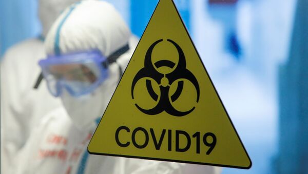 Знак за биолошку опасност у привременој ковид болници у Русији - Sputnik Србија