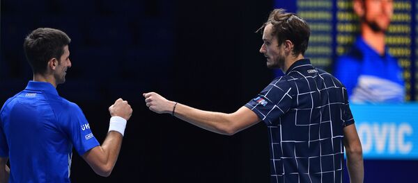 Новак Ђоковић и Данил Медведев - Sputnik Србија