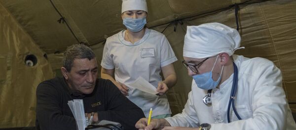 Lekari primaju pacijente u poljskoj bolnici u Stepanakertu u Nagorno-Karabahu Lekari primaju pacijente u poljskoj bolnici u Stepanakertu u Nagorno-Karabahu - Sputnik Srbija