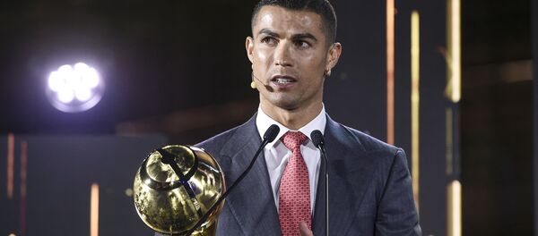 Кристијано Роналдо на пријему награде за фудбалера века Кристијано Роналдо на пријему награде за фудбалера века - Sputnik Србија