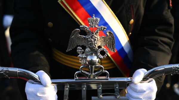 Grb i zastava Rusije na paradi kojom je obeležena godišnjica svečane parade 1941. godine u Moskvi - Sputnik Srbija