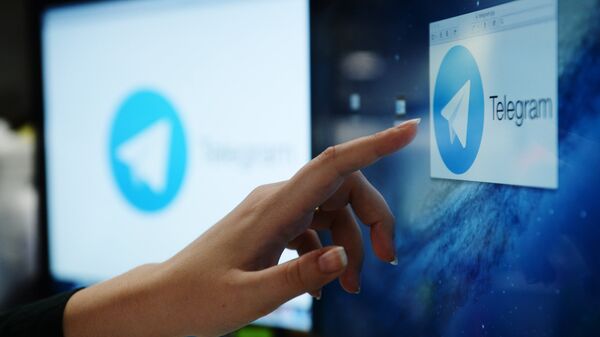 Telegram messenger service on a monitor screen - Sputnik Србија