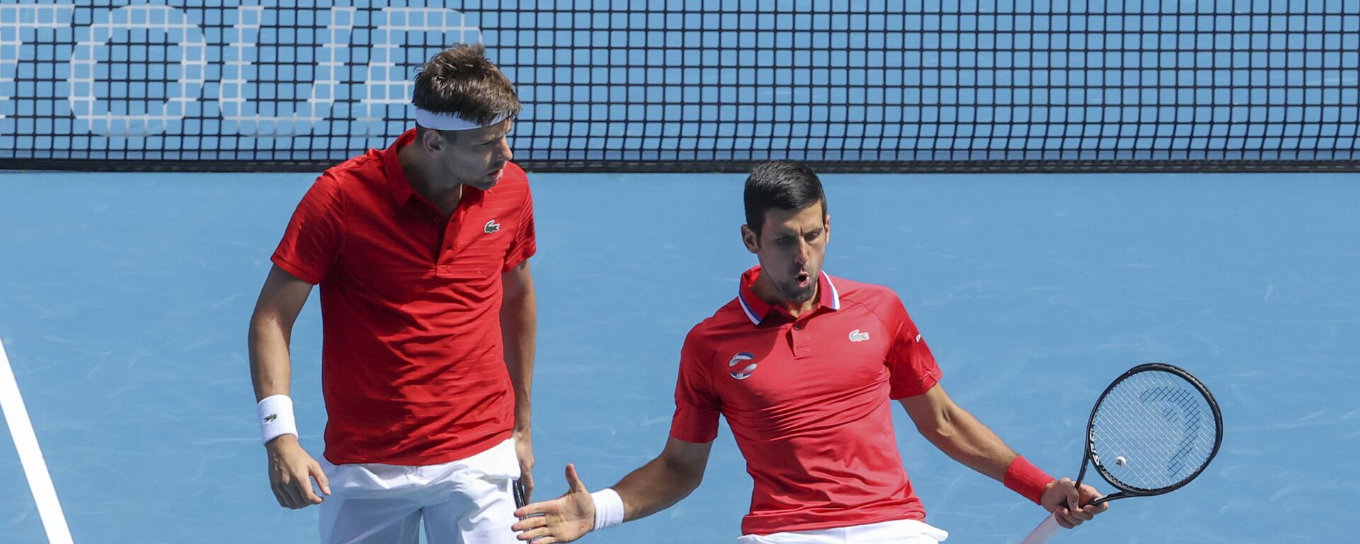 Filip Krajinović i Novak Đoković tokom meča na ATP kupu - Sputnik Srbija, 1920, 03.11.2021