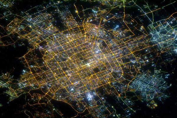 Пекинг ноћу, снимак руског космонаута Сергеја Куд-Сверчкова са Међународне свемирске станице - Sputnik Србија