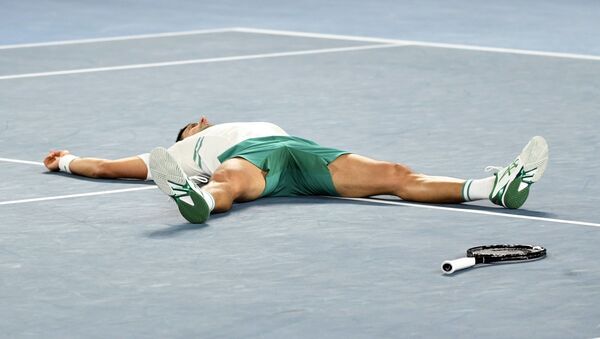 Novak Đoković po osvajanju titule na Australijan openu 2021. - Sputnik Srbija