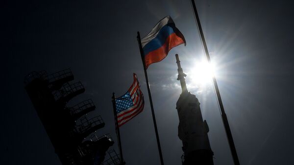 Zastave Rusije i SAD na kosmodromu Bajkonur - Sputnik Srbija