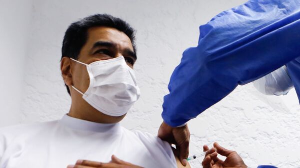 Nikolas Maduro prima rusku vakcinu  - Sputnik Srbija