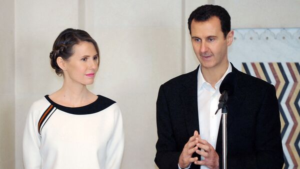 Председник Сирије Башар Асад са супругом Асмом - Sputnik Србија
