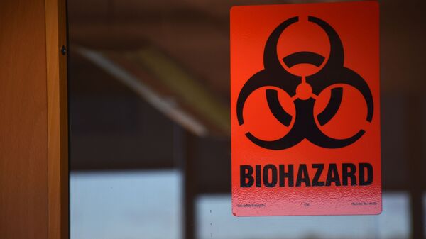 Znak za opasnost od biološkog oružja na vratima laboratorije u Gruziji - Sputnik Srbija
