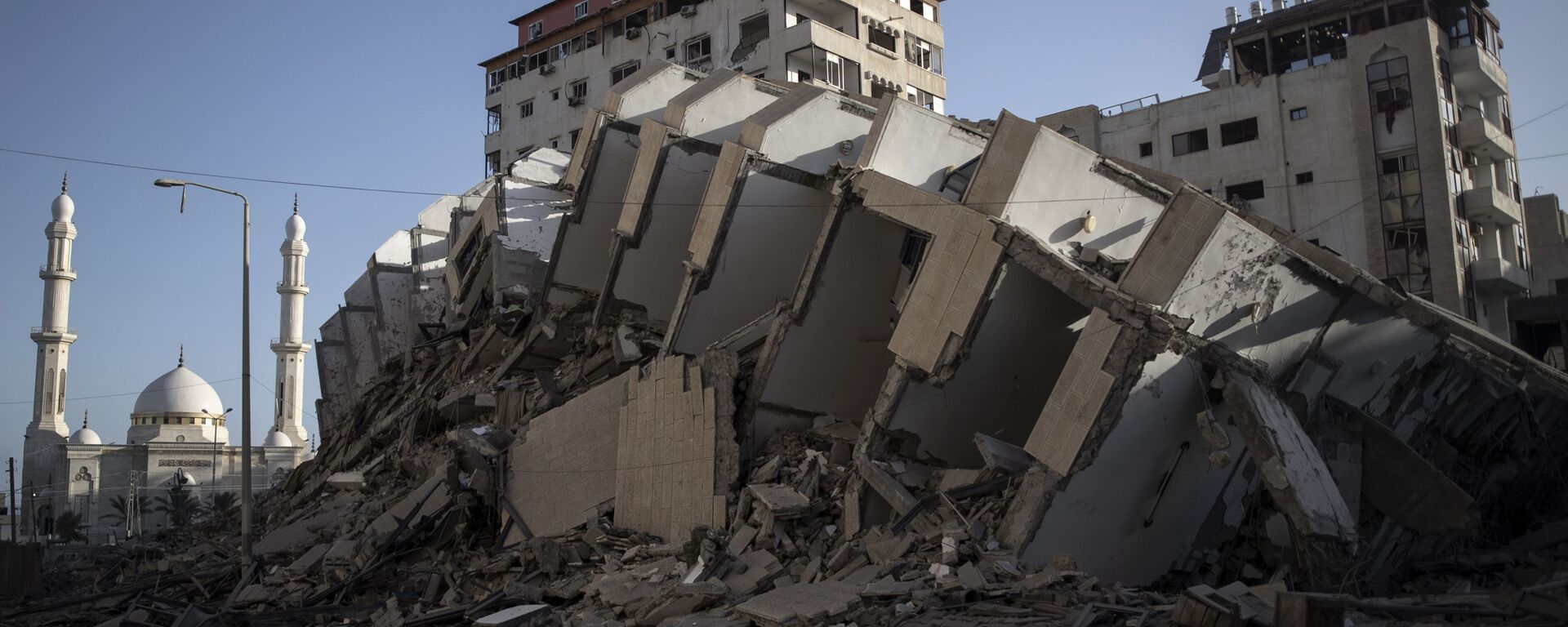 Сукоб Израела и Палестинаца, срушена зграда у појасу Газе - Sputnik Србија, 1920, 15.11.2023