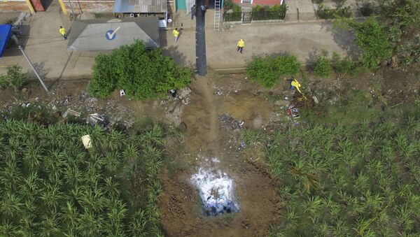 Vlasti Salvadora su počele sa iskopavanjem tajnog groblja iza kuće bivšeg detektiva - Sputnik Srbija