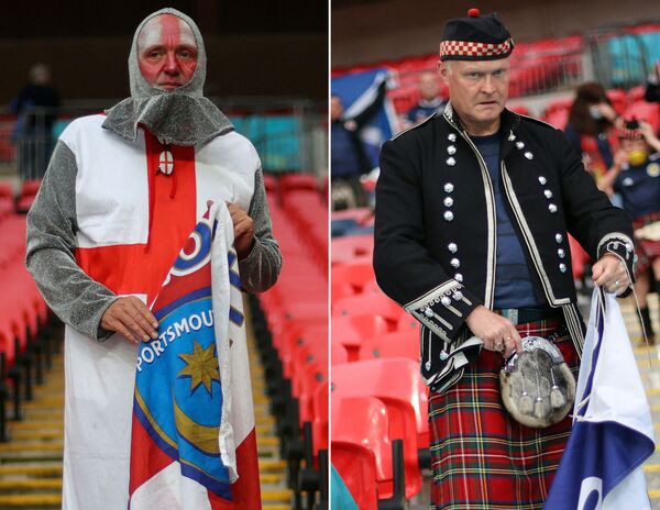 Navijač Engleske (levo) i Škotske pred duel njihovih reprezentacija 18. juna na Vembliju, u okviru EP u fudbalu - Sputnik Srbija