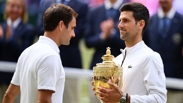 Rodžer Federer i Novak Đoković posle finala Vimbldona 2019. godine - Sputnik Srbija