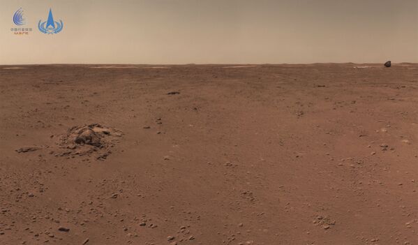 This handout photograph taken on July 4, 2021 and released on July 9, 2021 by the China National Space Administration (CNSA) shows the surface of Mars taken from China's Zhurong Mars rover. (Photo by HANDOUT / China National Space Administration (CNSA) / AFP) / -----EDITORS NOTE --- RESTRICTED TO EDITORIAL USE - MANDATORY CREDIT AFP PHOTO / CNSA - NO MARKETING - NO ADVERTISING CAMPAIGNS - DISTRIBUTED AS A SERVICE TO CLIENTS - Sputnik Srbija