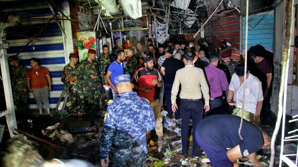 Scene nakon samoubilačkog napada na pijaci u Bagdadu - Sputnik Srbija