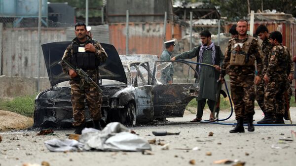 Безбедносне снаге у центру Кабула након што су ракете пале код председничке палате - Sputnik Србија