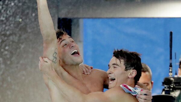Tom Delji (levo) proslavlja osvajanje bronze na Olimpijskim igrama u Rio de Žaneiru 2016. - Sputnik Srbija