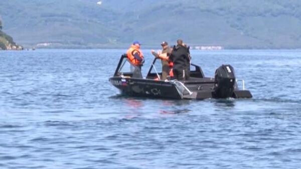 Potraga za olupinom i telima helikopterske nesreće u Kurilskom jezeru na Kamčatki - Sputnik Srbija