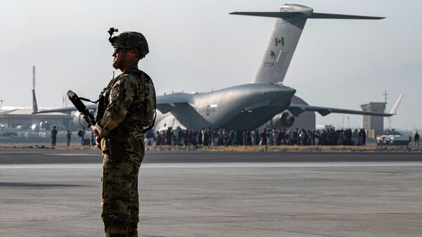 Evakuacija američkih državljana i Avganistanaca sa aerodroma u Kabulu - Sputnik Srbija