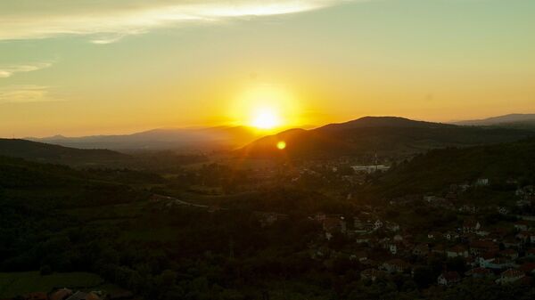Zalazak sunca iznad sela - Sputnik Srbija