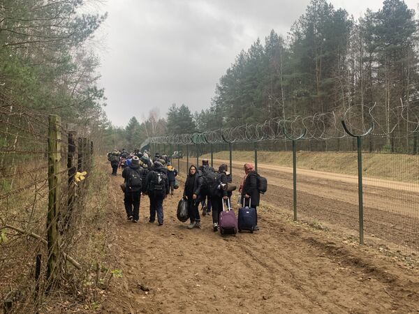 Migranti na belorusko-poljskoj granici. - Sputnik Srbija