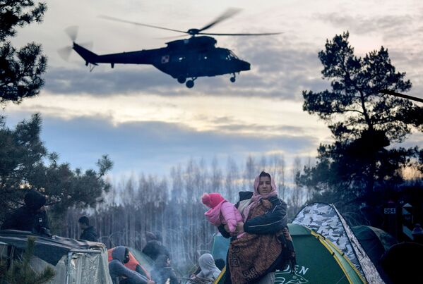 Камп за илегалне мигранте на белоруско-пољској граници. - Sputnik Србија