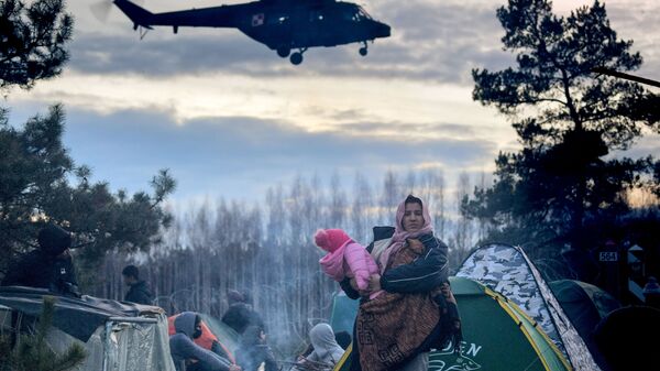 Лагерь нелегальных мигрантов на белорусско-польской границе - Sputnik Србија