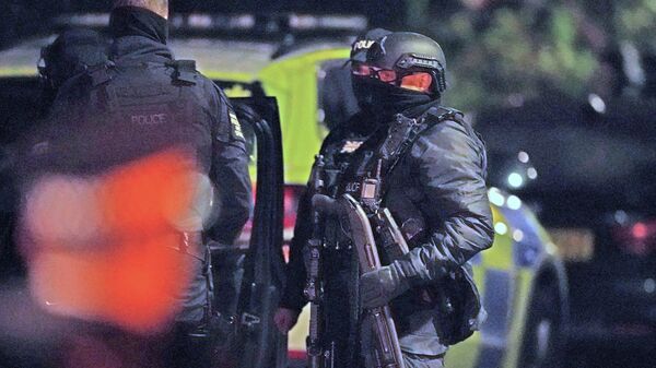 Наоружани полицајци након терористичког напада у Ливерпулу - Sputnik Србија