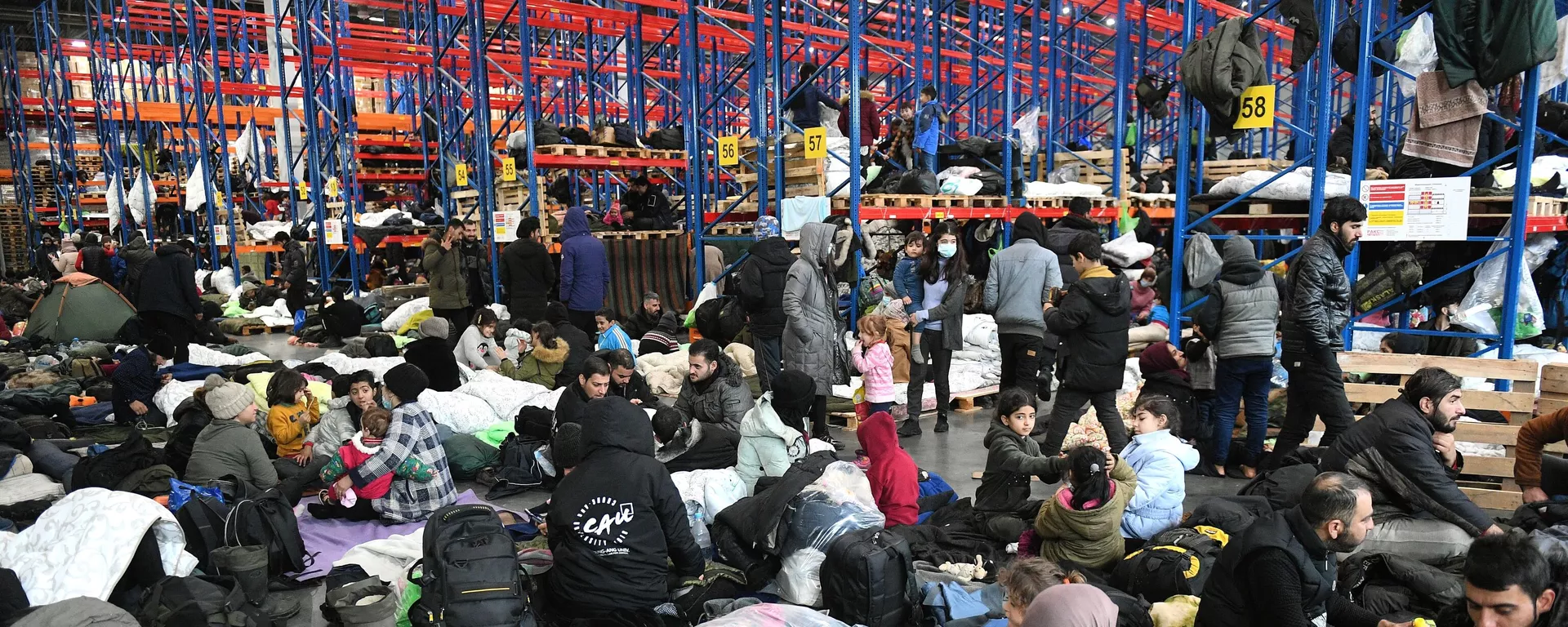 Migranti u privremenom smeštaju u blizini belorusko-poljske granice - Sputnik Srbija, 1920, 22.11.2021