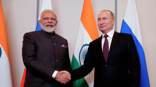 Predsednik Rusije Vladimir Putin  i premijer Indije Narendra Modi - Sputnik Srbija