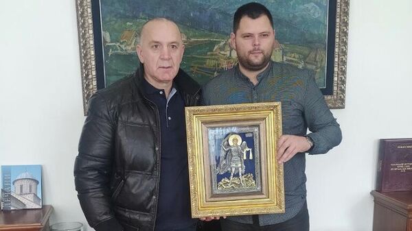 Prijem kod predsednika opštine Nikšić Marka Kovačević (desno) za poznatog boksera Ratka Draškovića koji je donirao bubreg sugrađanki - Sputnik Srbija
