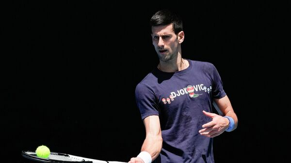 Novak Đoković na treningu pred početak Australijan opena 2022. - Sputnik Srbija