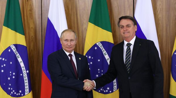 Председници Русије и Бразила, Владимир Путин и Жаир Болсонаро - Sputnik Србија
