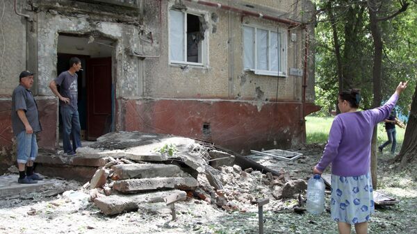 Posledice granatiranja naselja u Donbasu od strane ukrajinskih snaga bezbednosti - Sputnik Srbija