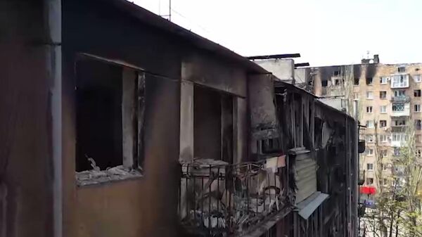 Уништени станови грађана Маријупоља
 - Sputnik Србија