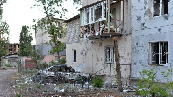 Автомобиль, уничтоженный при обстреле ВСУ в Северодонецке - Sputnik Србија