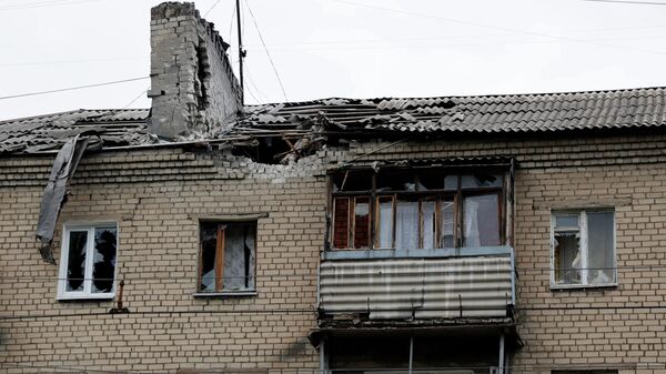 Зграда оштећена у гранатирању Доњецка - Sputnik Србија